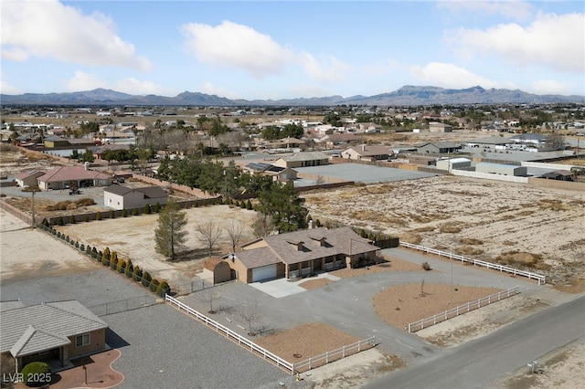 drone / aerial view with a residential view and a mountain view