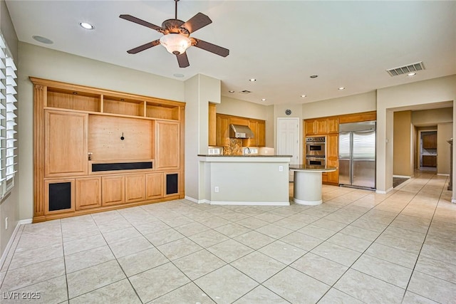 unfurnished living room featuring visible vents, a ceiling fan, recessed lighting, light tile patterned floors, and baseboards