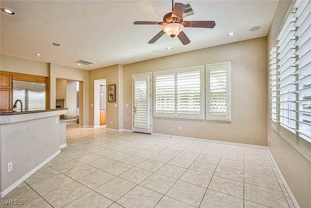 unfurnished room featuring recessed lighting, visible vents, baseboards, and light tile patterned flooring