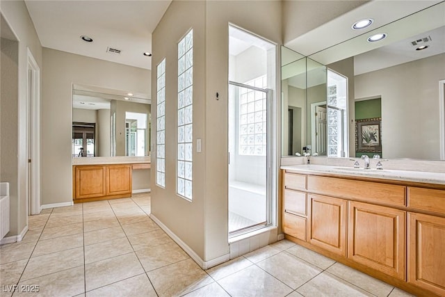 full bath featuring visible vents, a stall shower, vanity, and tile patterned flooring