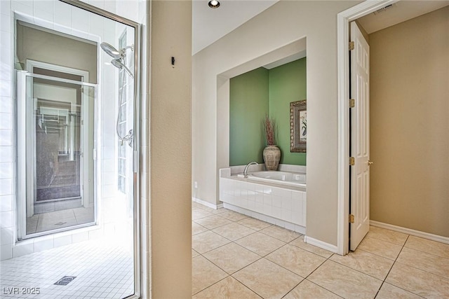 full bathroom with visible vents, baseboards, a bath, and tile patterned flooring