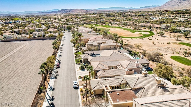 aerial view with a mountain view and a residential view