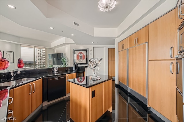 kitchen featuring visible vents, dark tile patterned flooring, recessed lighting, a sink, and black dishwasher