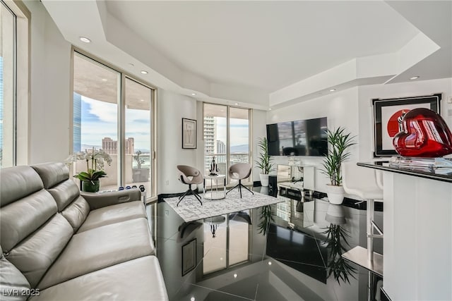 living room featuring recessed lighting and tile patterned floors