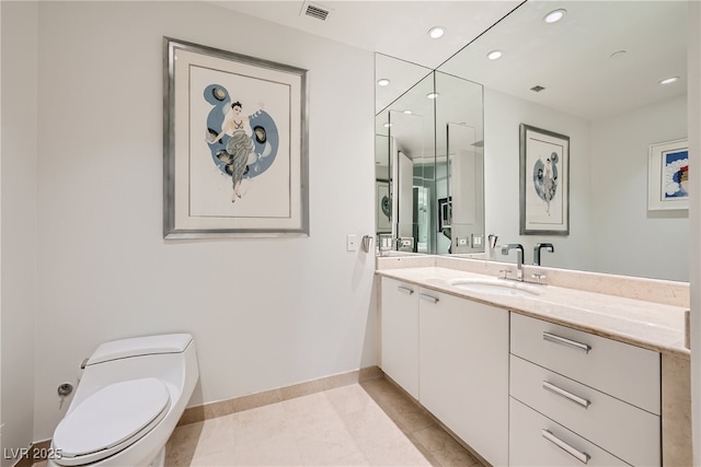 bathroom with visible vents, toilet, recessed lighting, baseboards, and vanity