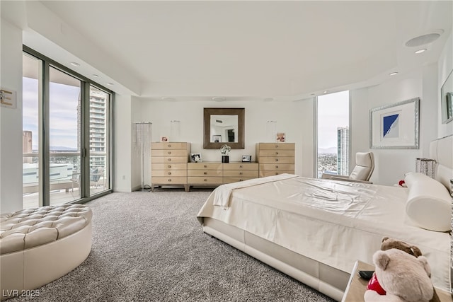 carpeted bedroom with access to outside and recessed lighting