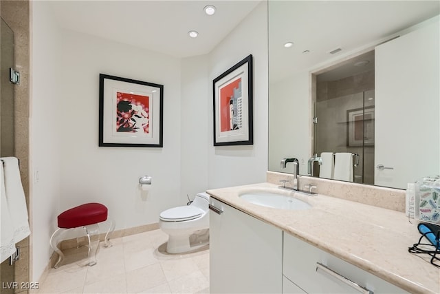 full bath with vanity, baseboards, a shower stall, tile patterned floors, and toilet