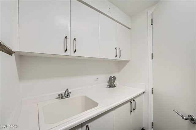 laundry room with a sink