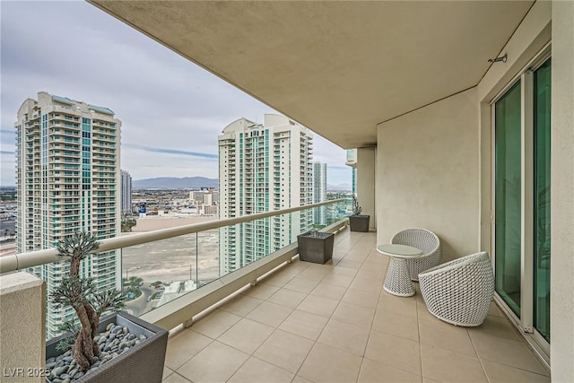 balcony featuring a city view