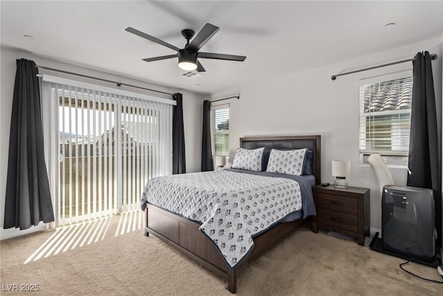 bedroom featuring visible vents, carpet floors, and ceiling fan