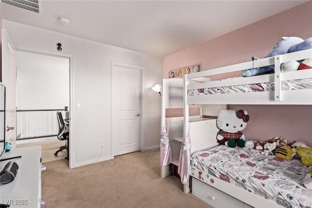 bedroom with visible vents, baseboards, and carpet flooring