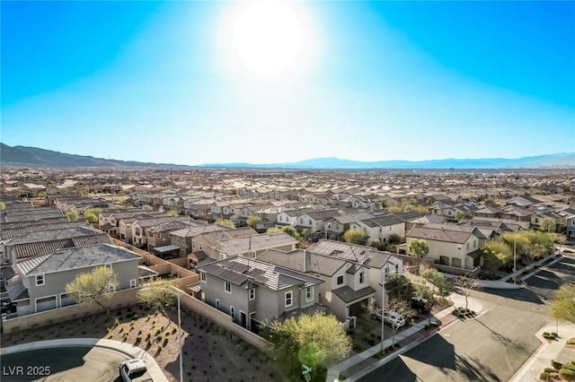 drone / aerial view with a mountain view and a residential view