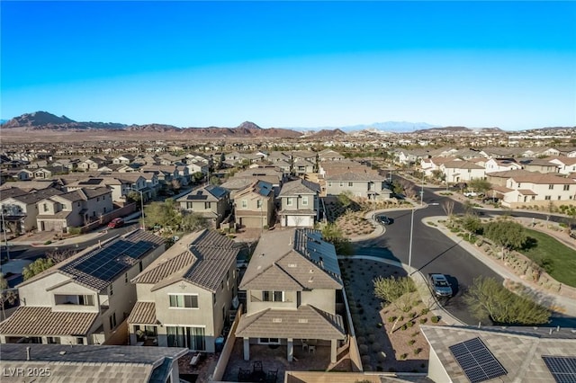 aerial view featuring a mountain view and a residential view