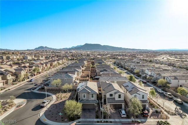 aerial view featuring a mountain view and a residential view