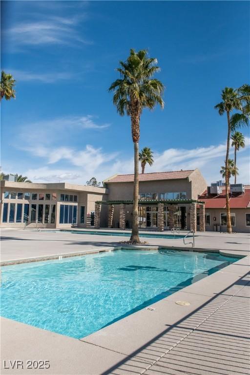 community pool with a patio