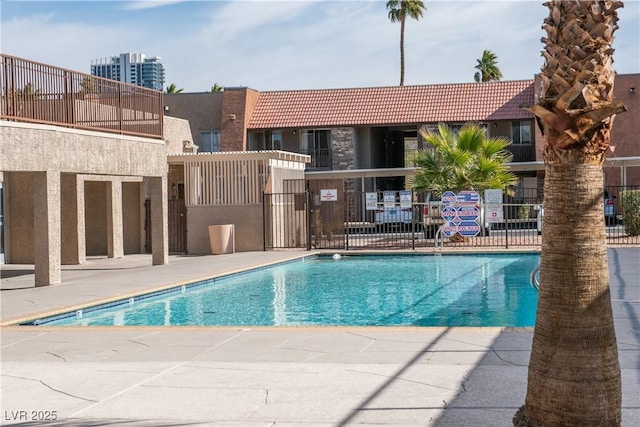 community pool with fence