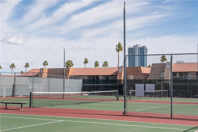 view of sport court featuring community basketball court and fence