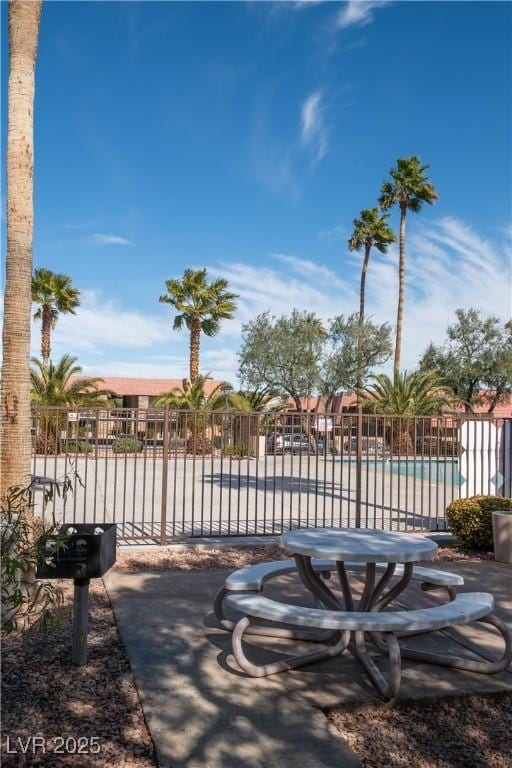 view of pool with fence