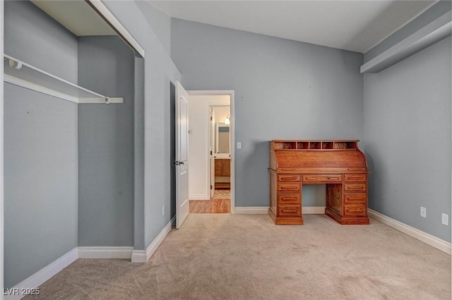 unfurnished bedroom featuring baseboards and carpet