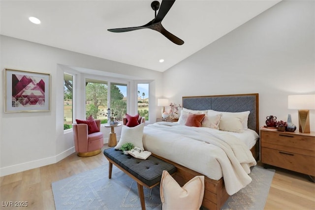 bedroom featuring lofted ceiling, recessed lighting, light wood-style floors, and baseboards