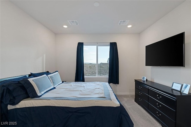 bedroom with recessed lighting, visible vents, light colored carpet, and baseboards