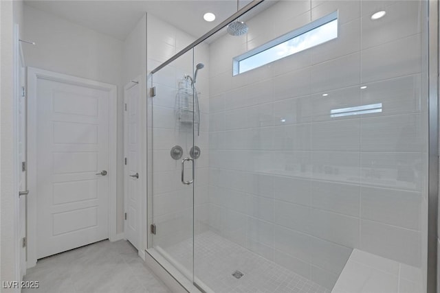 full bathroom with a shower stall