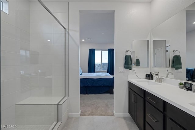 ensuite bathroom with tiled shower, ensuite bath, double vanity, a sink, and tile patterned flooring