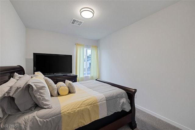 bedroom featuring visible vents, baseboards, and carpet floors