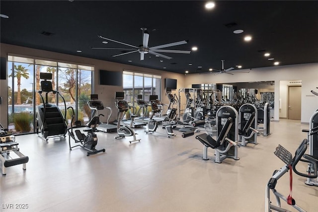 exercise room featuring visible vents and a ceiling fan