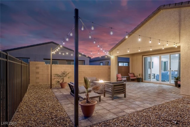 view of patio featuring a fenced backyard and outdoor lounge area