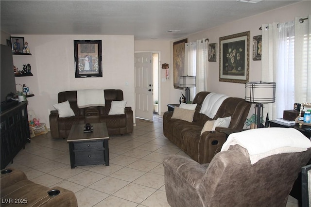 living room featuring light tile patterned floors