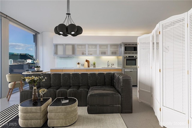 living room featuring a chandelier