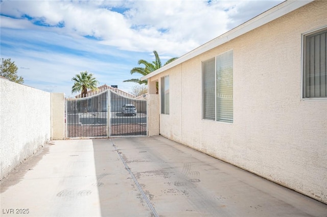 exterior space with a patio area and fence