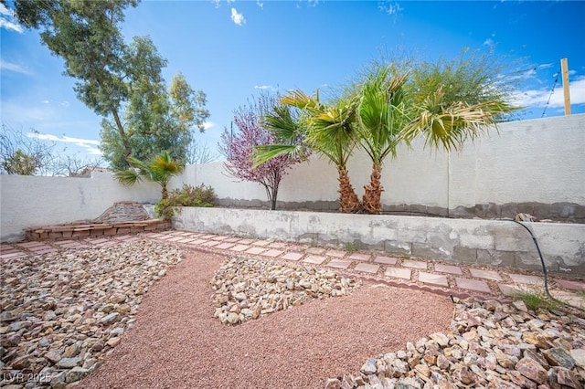 view of yard featuring a fenced backyard