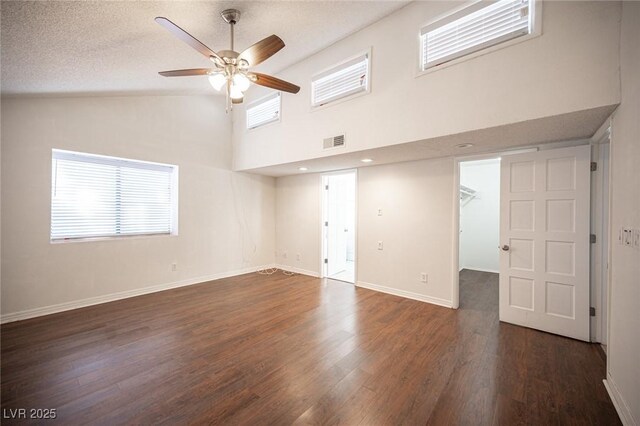 3369 Milenko Dr, Las Vegas, NV 89121 - unfurnished room featuring a ceiling fan, high vaulted ceiling, wood finished floors, and baseboards