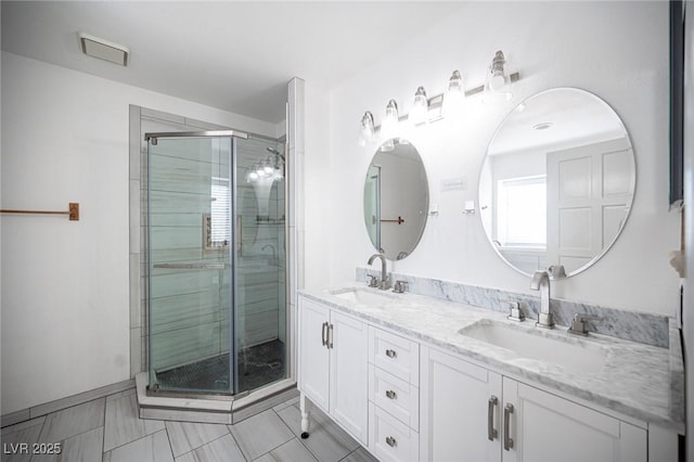 3369 Milenko Dr, Las Vegas, NV 89121 - bathroom with double vanity and a stall shower