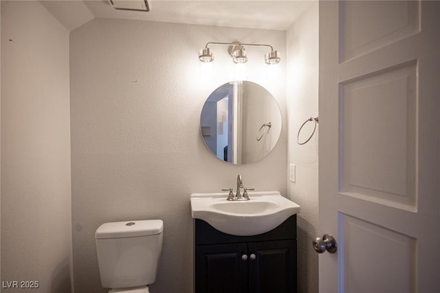 3369 Milenko Dr, Las Vegas, NV 89121 - bathroom with vanity and toilet
