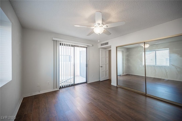 3369 Milenko Dr, Las Vegas, NV 89121 - unfurnished bedroom featuring wood finished floors, a textured ceiling, baseboards, ceiling fan, and a closet