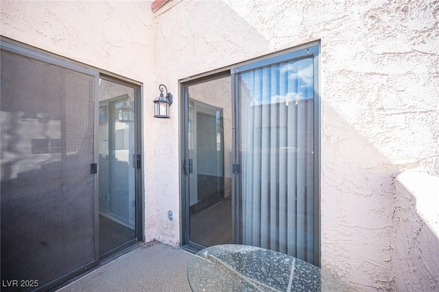3369 Milenko Dr, Las Vegas, NV 89121 - property entrance with stucco siding