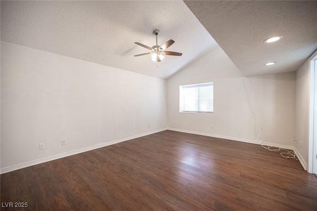 3369 Milenko Dr, Las Vegas, NV 89121 - spare room with a textured ceiling, ceiling fan, baseboards, dark wood-type flooring, and lofted ceiling