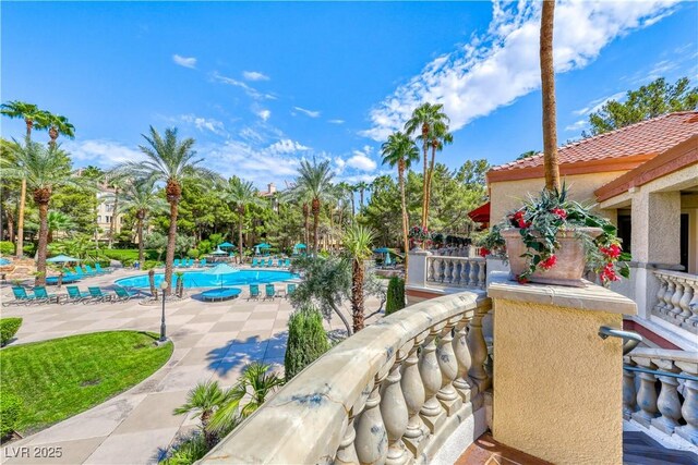 view of patio / terrace featuring a community pool