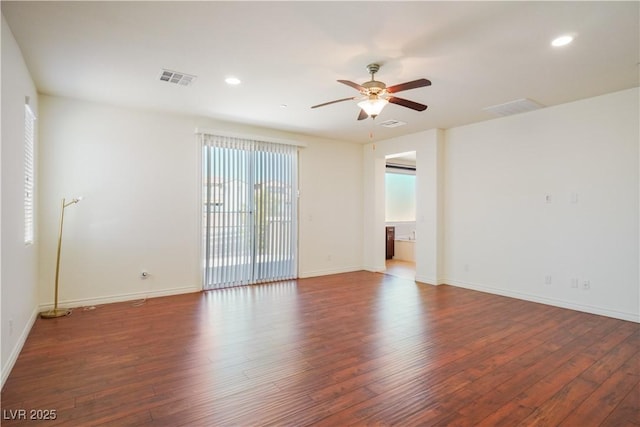 spare room with recessed lighting, visible vents, wood-type flooring, and ceiling fan