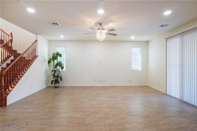 spare room featuring recessed lighting, visible vents, and a healthy amount of sunlight