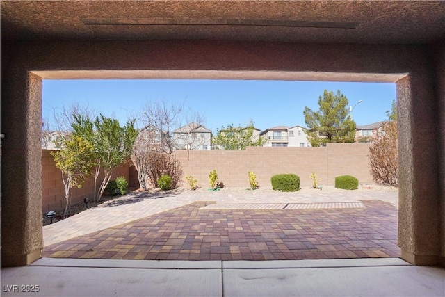 view of patio featuring a fenced backyard