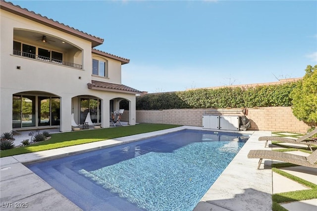 view of pool with a patio, a fenced backyard, and a fenced in pool