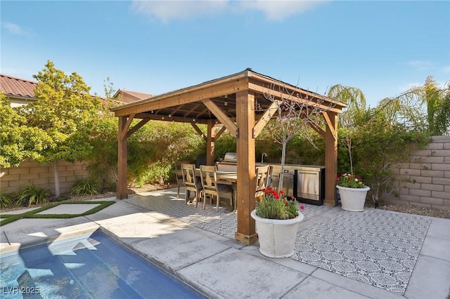 view of patio / terrace featuring a gazebo, outdoor dining space, and a fenced backyard