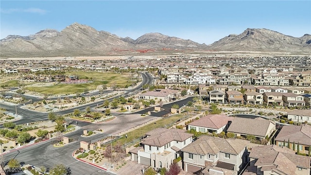 birds eye view of property with a residential view and a mountain view