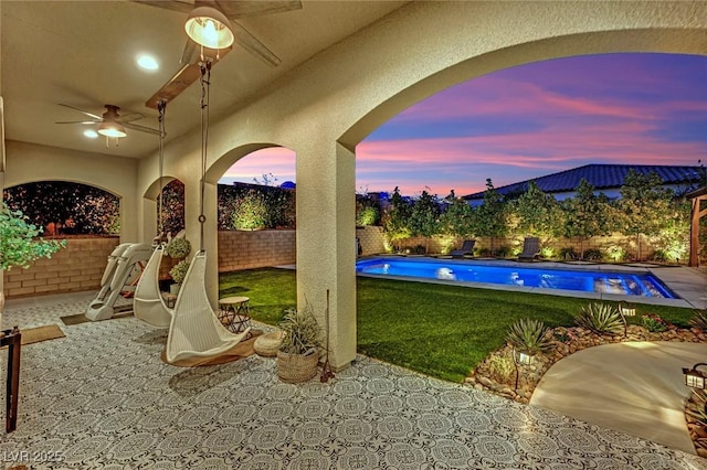 view of patio featuring a fenced backyard and a fenced in pool