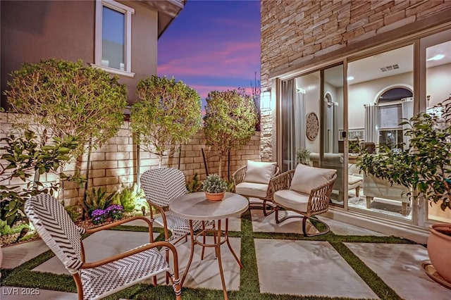 view of patio with visible vents