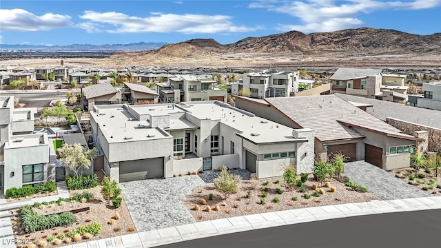 aerial view with a mountain view and a residential view